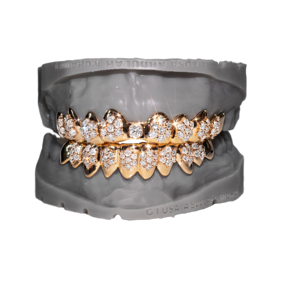 Rose gold full set grillz with alternating diamond clusters and center solitaire